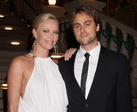 Theron posing with her ex-lover Stuart